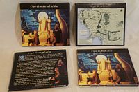 Front and back view of one Lord of the Rings abridged audiobook CD set in illustrated cardboard case with character art and text back