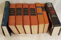 Seven hardcover books including six by Winston Churchill and one biography of Churchill by William Manchester. Books show light age wear on spines and pages.