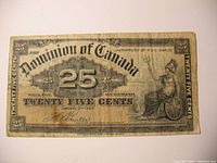 Obverse side showing denomination, Dominion of Canada inscription, date, and Britannia figure.