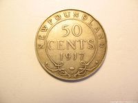 Reverse of the 1917 Newfoundland silver 50 cents coin showing denomination, year, and decorative elements.