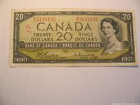 Front side of the 1954 Canadian $20 banknote showing portrait of Queen Elizabeth II and serial number 5123135.