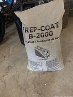 Full bag of Prep-Coat B-2000 base coat with product details visible.
