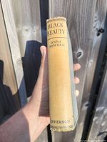 View of the book spine showing title, author, and publisher Ryerson, with aged and worn edges.