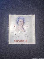 Close-up of first Canada 8 cent 1973 stamp showing Queen Elizabeth II portrait and text.