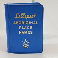Front cover of the miniature book titled 'Lilliput Aboriginal Place Names' in blue with gold lettering.