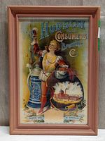 Framed vintage Hudson County Consumers Brewing Co. poster showing full view of artwork with man in costume and brewery image