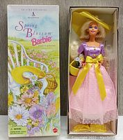 Special Edition Spring Blossom Barbie doll in original box with floral artwork and doll dressed in spring-themed clothing.