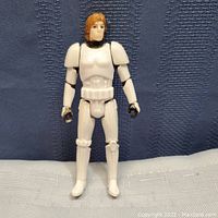 Front view of Luke Skywalker Stormtrooper action figure showing detailed face and armor.