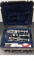 Clarinet parts disassembled in blue velvet lined case