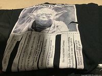 Yoda themed Star Wars t-shirt with printed words of wisdom, size 5X or 4X