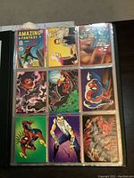 Front view of Ultra Pro collectors binder with pages of Spider-Man 30th anniversary comic cards in plastic sleeves showing colorful illustrations including Spiderman action poses and characters.