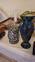 Photo of both vases together showing the overall size and mosaic design.