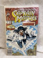 Front cover of Captain Marvel Giant Size Special Reborn Issue No. 1 comic book, showing the character flying with cityscape background.