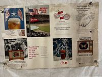 Photo of one side of the double-sided 1964 Phillies World Series advertising poster showing branded ads and game images with visible wear