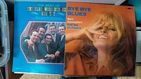Photo shows two LP record album covers: The Best of The Blackwood Brothers Quartet and Bye Bye Blues by Bert Kaempfert and His Orchestra, highlighting the vintage condition and variety in genres.