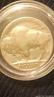 Reverse side of the 1937 Buffalo Nickel showing American bison and inscriptions.