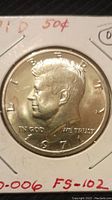 Obverse of 1971 D Kennedy Half Dollar Coin showing profile of President Kennedy with 'LIBERTY', 'IN GOD WE TRUST', and date 1971.