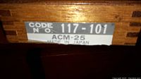 Label on wooden case shows Code No. 117-101 ACM-25 Made in Japan