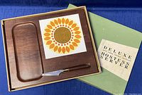 Photo of the hardwood hostess server board inside original open box with knife