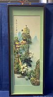 Full view of the framed 3D carved Asian mother of pearl shell wall art plaque, showing the entire scenic landscape with mountains, buildings, and trees.