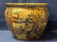 Front detailed view of hand-painted geisha figures and landscape motifs on the bowl exterior