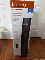 Front and side views of the Lasko Elite Collection digital ceramic tower heater box showing product image, branding, and feature highlights.