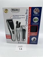 Front of WAHL Cordless Pro Home Barber Kit box showing hair clipper, detail trimmer, ear/nose/brow trimmer and branding.