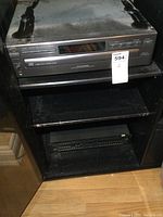 Front view of JVC XL-F207 CD changer with digital display and disc select buttons