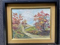 Full view of the oil on panel painting showing autumn landscape with path, trees, and sky in textured impasto style framed in black and gold frame.