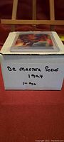 Box labeled 'DC Master Series 1994 1-90' containing trading cards.
