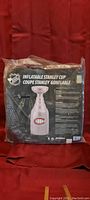 Photo of sealed packaging showing the inflatable Stanley Cup with Montreal Canadiens logo and NHL logo, product details and description.
