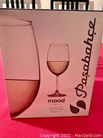 Box of Pasabahce Mood Collection wine glasses showing branding, collection name, and capacity (300 ml, 10 fl oz).