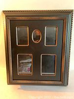 Front view of the closed rectangular key cabinet box shows six distinct glass windows in the front door with a ridged decorative border around the frame.