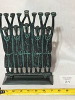 Front view showing entire menorah and base