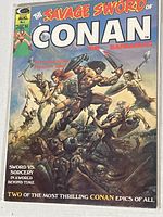 Front cover of the comic showing Conan fighting multiple enemies, with the title and issue number visible.