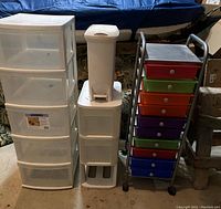Photo showing all three storage units together with background covered, highlighting clear detail of drawers and trash bin placement