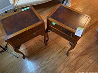 Front view of both nightstands showing shape, legs and drawer fronts