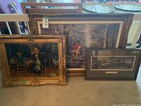 Photo of the three art pieces together showing their frames and relative sizes.