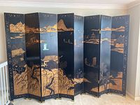 Full view of both screens connected showing complete eight-panel landscape