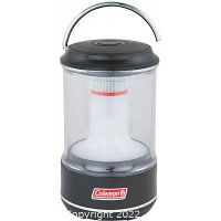 Front view of Coleman LED lantern showing clear globe, black base and top with Coleman logo, and metal handle.
