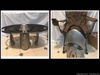 Foldable gas grill in unfolded position, showing dual circular grill plates and rocket-style base