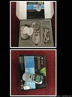 Top view of the open box showing the digital therapy unit, electrode pads, wires, and user manual inside a foam insert.