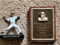 Mariano Rivera figurine pitching and Babe Ruth bronze plaque dated April 19, 1949