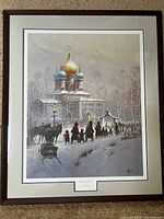 Framed and matted print titled "Whosoever Believeth" by G. Harvey displayed on floor. Shows scene of snowy winter church with golden and blue domes, people, horses, and a sleigh.