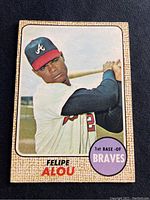 Front of 1968 O-Pee-Chee Felipe Alou baseball card showing player image and position.