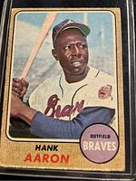 Front of the 1968 O-Pee-Chee Hank Aaron baseball card showing the player in a batting stance in Braves uniform with name and position.