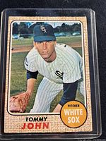 Front of the 1968 O-Pee-Chee baseball card showing Tommy John in his White Sox uniform with glove.