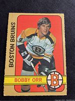 Front of 1972-73 O-Pee-Chee Bobby Orr Toronto hockey card showing player in Boston Bruins uniform.