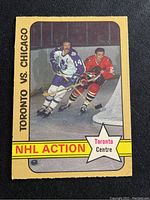 Front view of 1972-73 O-Pee-Chee hockey card showing Dave Keon in a Toronto Maple Leafs vs Chicago game action scene.