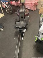 Front-on view showing entire rower, seat, handlebar and rail
